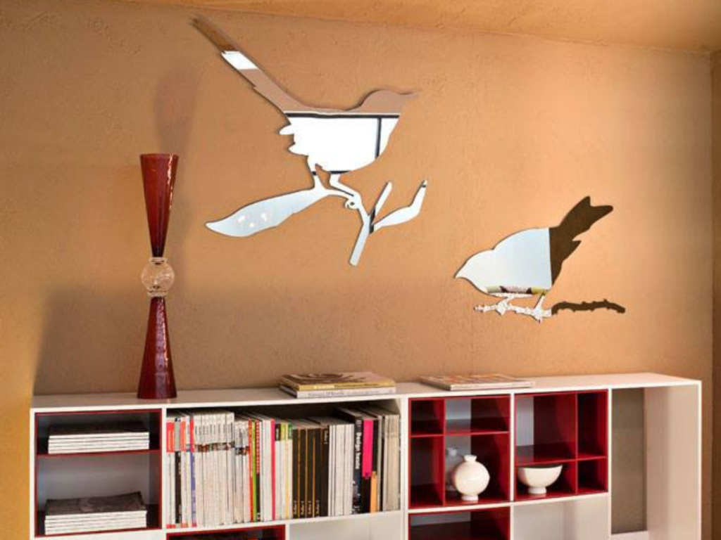 Modern bookshelf with maximalism stylized flying birds wall decoration